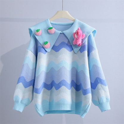 Pull en tricot pour femme avec des appliques ludiques et un motif en vagues Chic und Stil