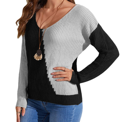 Pull décontracté pour femmes avec jeu de couleurs asymétrique et décolleté en V Chic und Stil