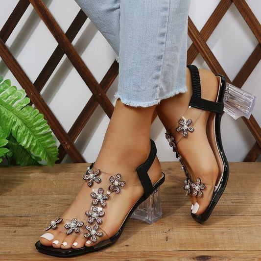 Sandales élégantes pour dames avec applications florales et talon transparent Chic und Stil