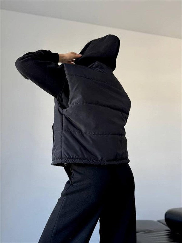 Dames gilet matelassé avec capuche Chic und Stil