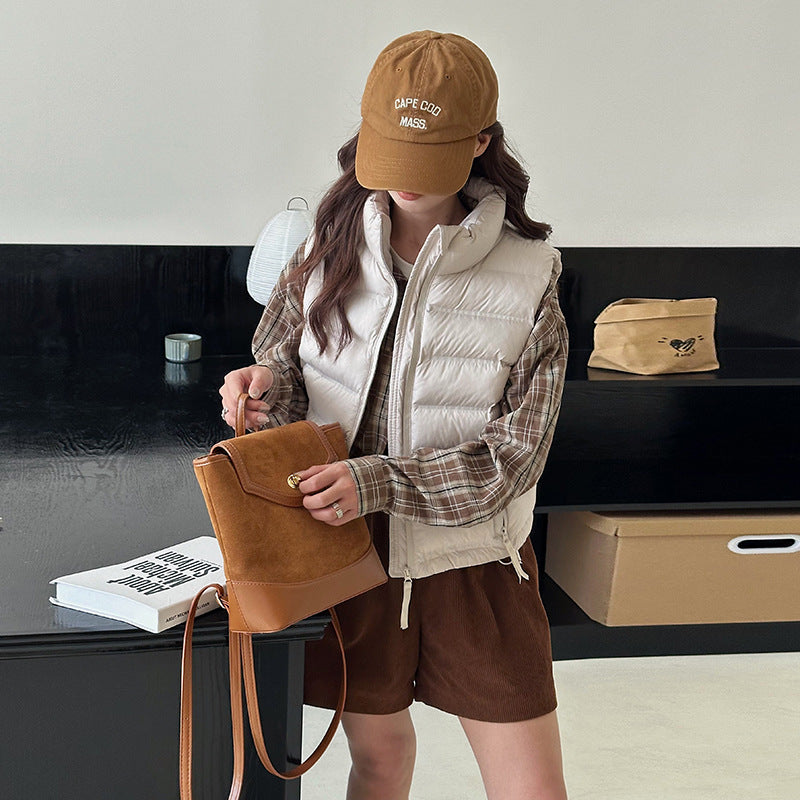 Dames gilet matelassé avec cordon de taille ajustable et poches pratiques Chic und Stil