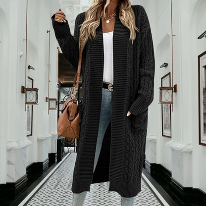 Veste en tricot pour femmes avec design de grosses tresses et poches pratiques Chic und Stil