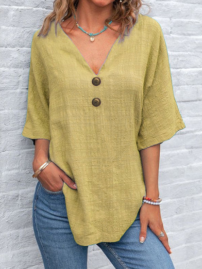 Blouse dames à col en V avec boutons décoratifs et coupe décontractée Chic und Stil