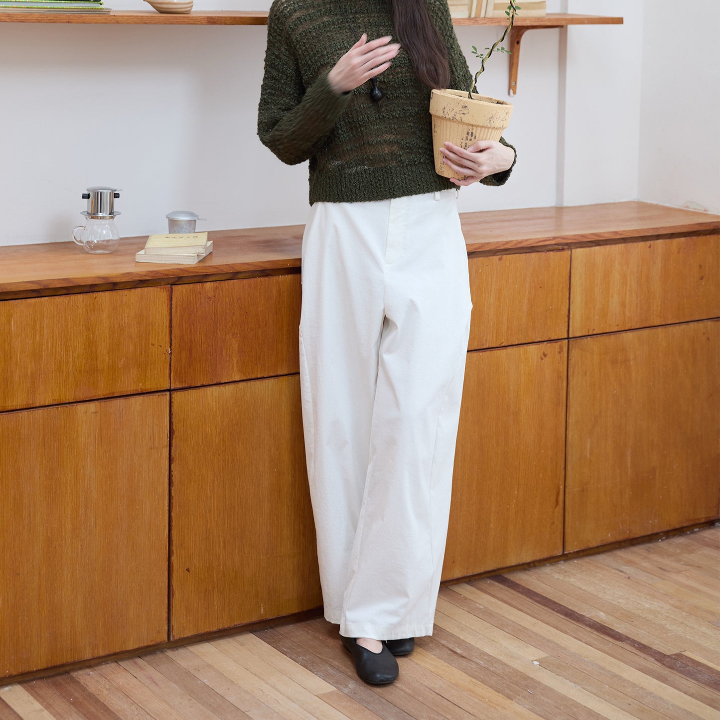 Wide cotton pants for women with a minimalist design featuring high pockets Chic and Style