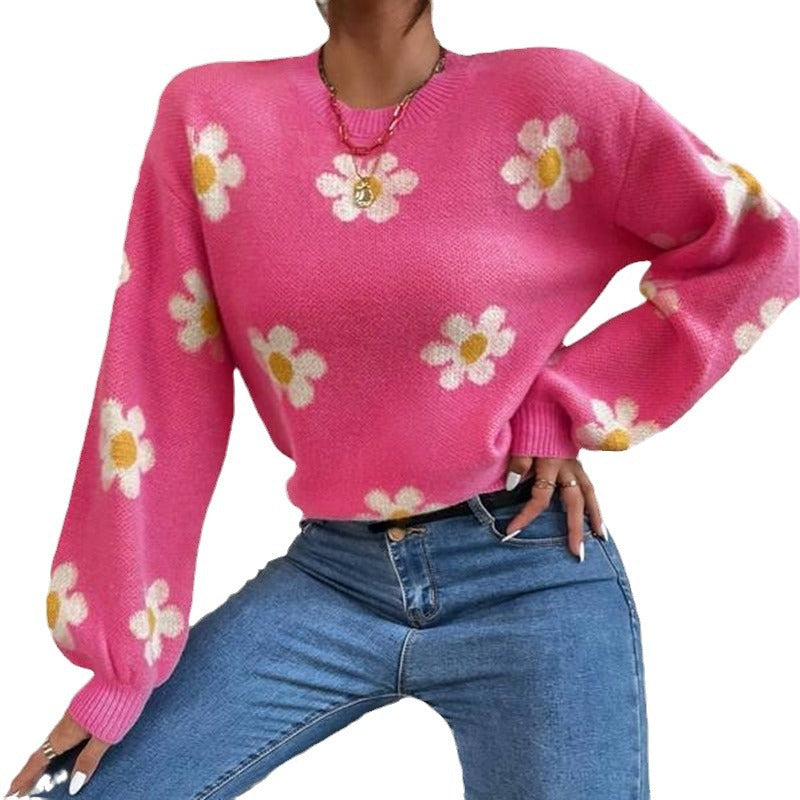 Pull en tricot pour femmes avec un motif floral ludique et des manches bouffantes élégantes Chic und Stil