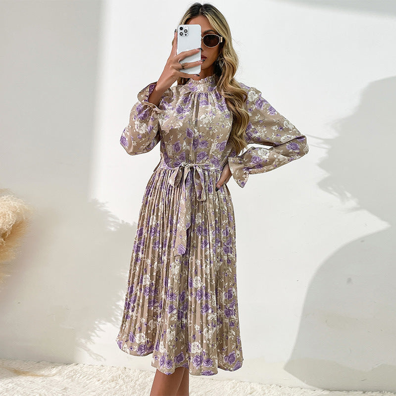 Robe midi pour dames avec motifs floraux et ceinture ajustable Chic und Stil