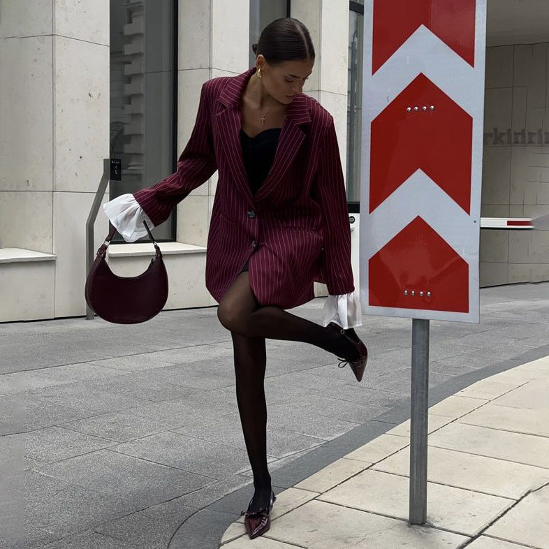 Blazer pour femmes au look rayé élégant avec des manches volumineuses Chic und Stil
