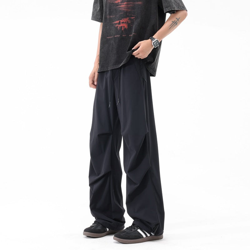 Loose sports pants for men with a remarkable draped design Chic and Style