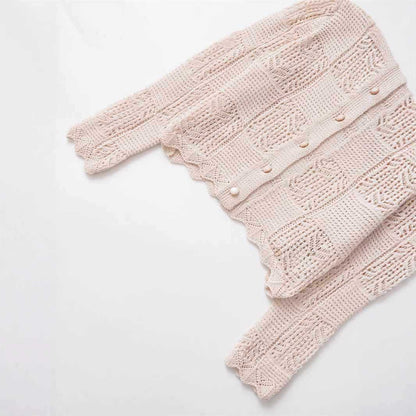 Dames cardigan en tricot confortable avec des boutons décoratifs et un design à volants tendance Chic und Stil