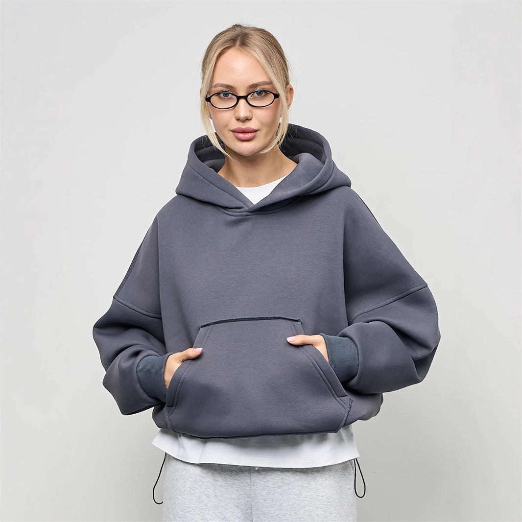 Pull à capuche oversized pour femmes avec une coupe décontractée et une poche kangourou pratique Chic und Stil