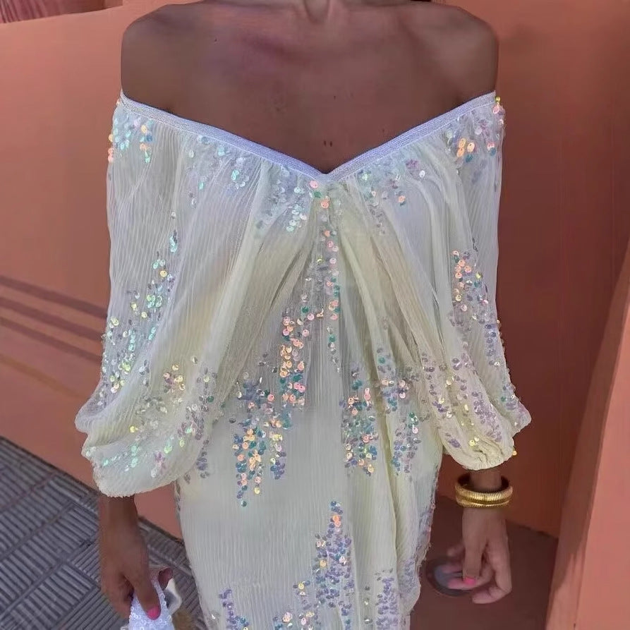 Robe maxi pour femmes avec de volumineuses manches bouffantes et un design en strass floral Chic und Stil