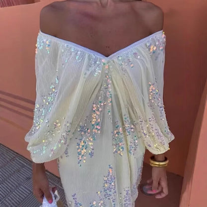 Robe maxi pour femmes avec de volumineuses manches bouffantes et un design en strass floral Chic und Stil