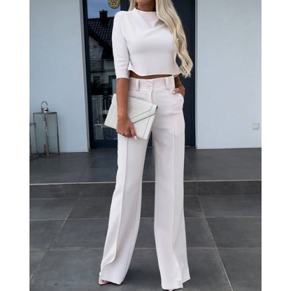 Woman trendy cropped top with elegant palazzo pants Chic and Style