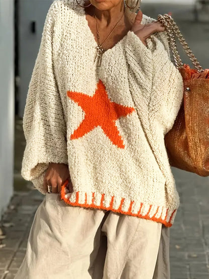 Pull en tricot femme avec col en V et motif étoilé frappant Chic und Stil