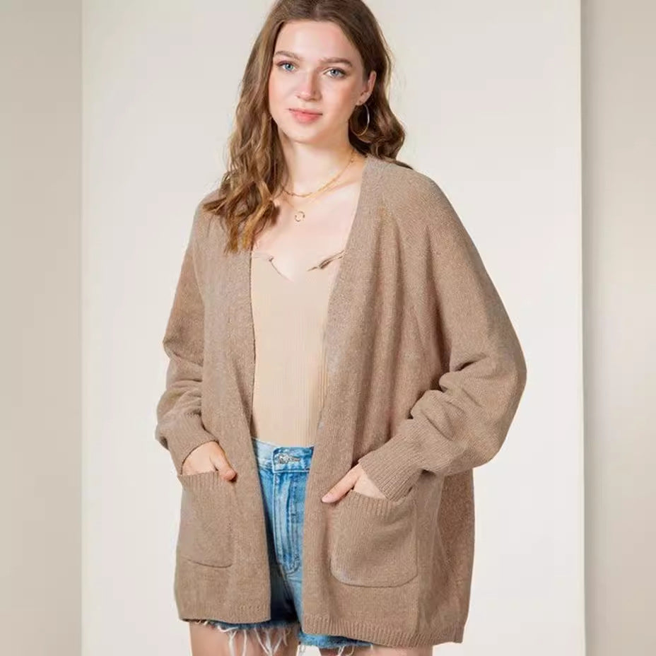 Dames Pull en tricot douillet avec poches latérales et devant ouvert Chic und Stil