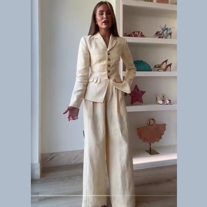 Elegant suit set for women with fitted jacket and wide-leg pants Chic and Style