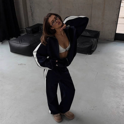 Women's sporty outfit with trendy zipper and wide pants Chic and Style