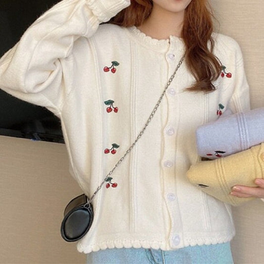 Cardigan pour femmes avec motif floral et fermeture à boutons Chic und Stil