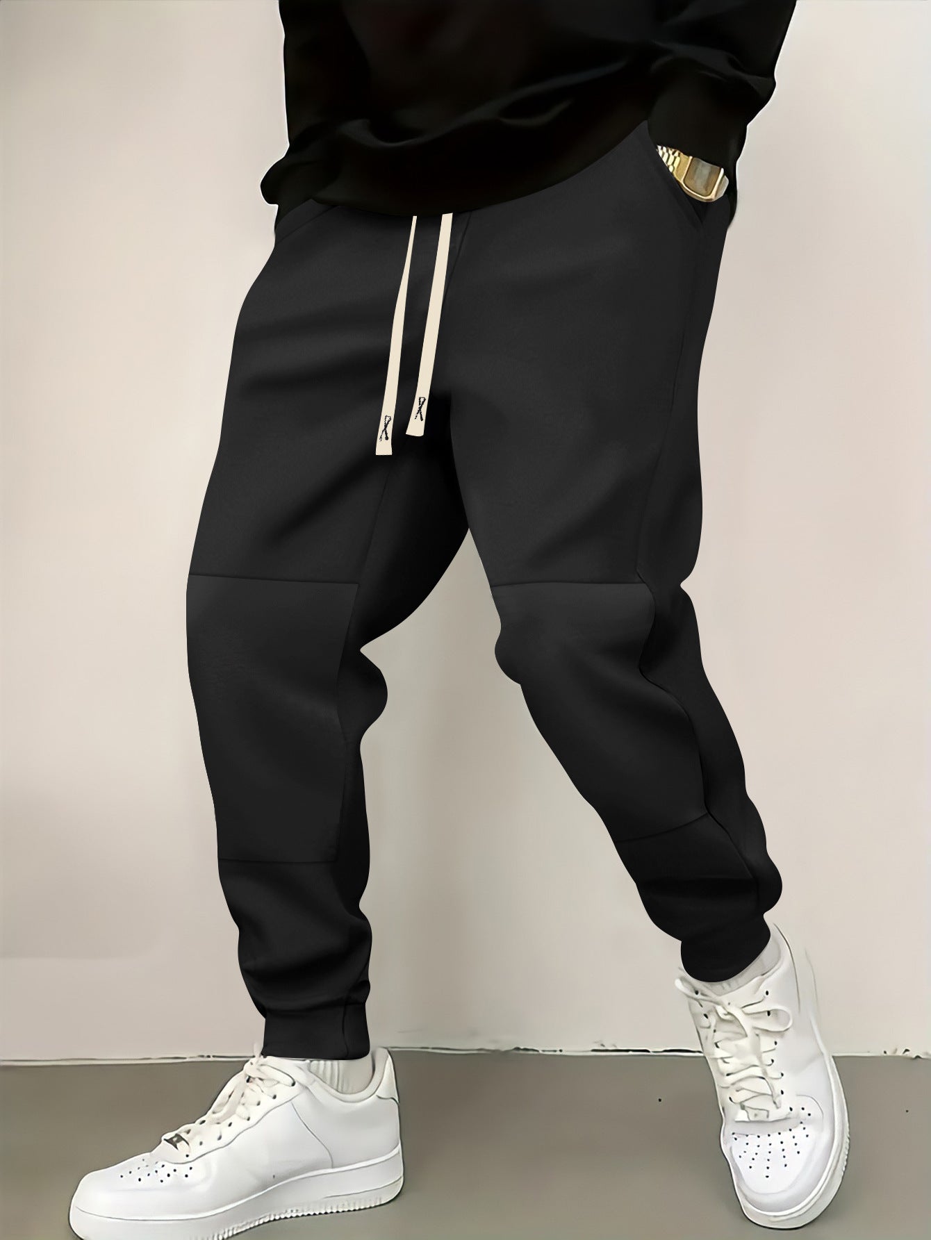 Chic and stylish men's athletic pants with modern color-block elements