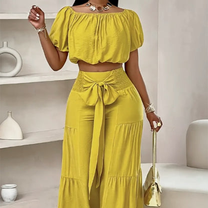 Woman Deep V-Neck Crop Top and High-Waisted Palazzo Pants Chic and Style