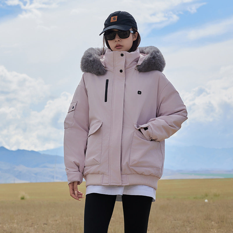 Dame manteau de puffer isolé avec col en fausse fourrure amovible et grandes poches frontales Chic und Stil