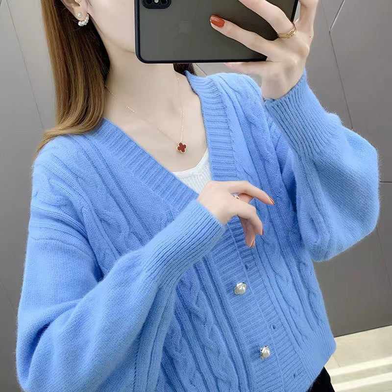 Knitted jacket for women with an elegant braid pattern and high-quality button details Chic and Style