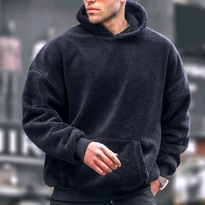 Oversized fleece pullover for men with practical pockets and hood Chic and Style