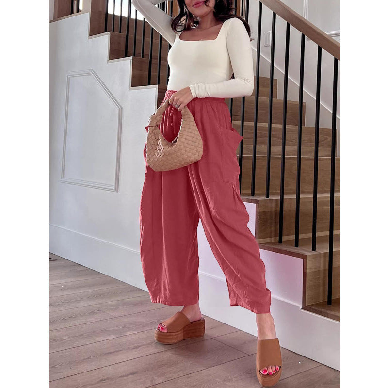 Casual harem pants for women with practical side pockets and loose fit Chic and Style
