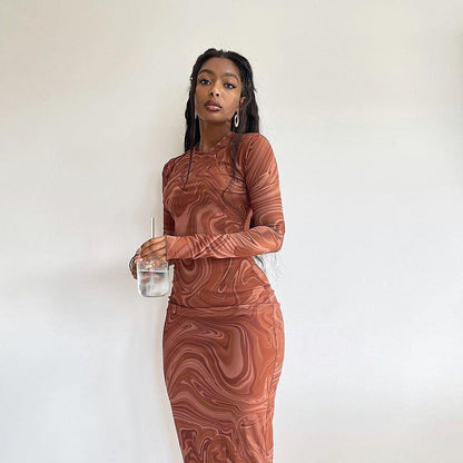 Robe élégante à manches longues pour femmes avec un motif marbré moderne et une coupe cintrée Chic und Stil
