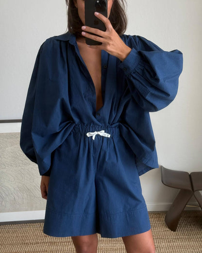 Woman casual outfit combined with loose blouse and shorts Chic and Style