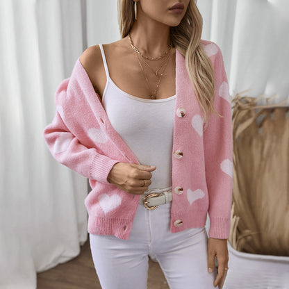 Veste en tricot mode pour femmes avec motifs de cœurs et boutons Chic und Stil