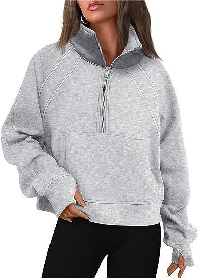 Dames pull-over mi-zip moelleux avec capuche et poche kangourou Chic und Stil