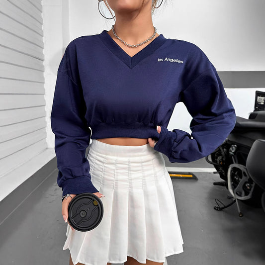 Sweatshirt cropped pour femmes à col V avec des manches volumineuses Chic und Stil