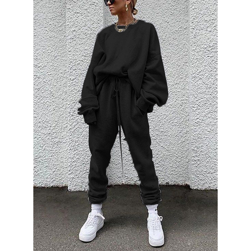 Women casual and comfortable leisure set with an oversized sweater and chic jogging pants and style