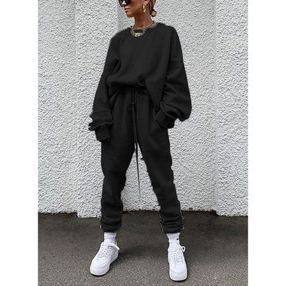 Women casual and comfortable leisure set with an oversized sweater and chic jogging pants and style