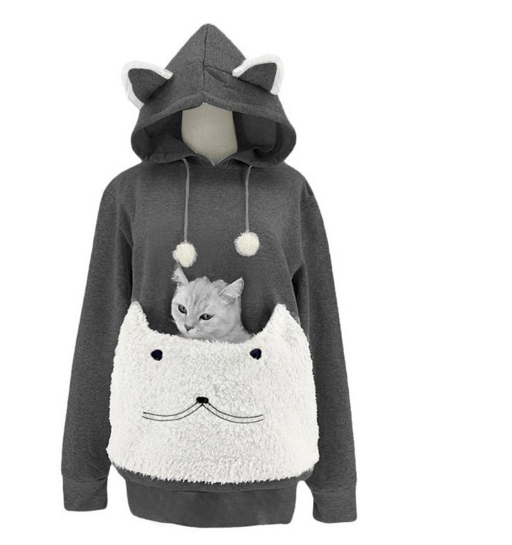 Dames Pull à capuche douillet avec motif de chat et poche kangourou pratique Chic und Stil