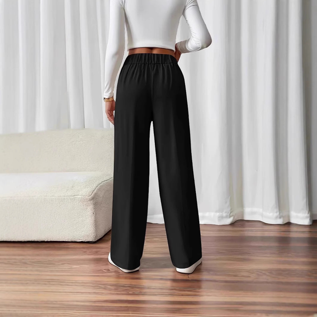 High-waisted palazzo pants for women with side pockets and decorative button details Chic and Style