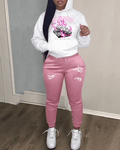 Women's hoodie and jogger pants set with a captivating graphic design Chic and Style