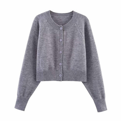 Cropped knit jacket for women with button details and elastic waistband Chic und Stil