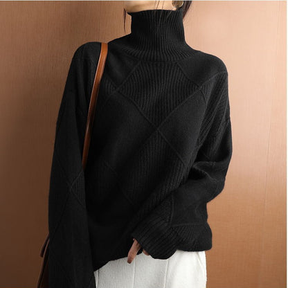 Pull femme à col montant tendance avec une optique structurée Chic und Stil