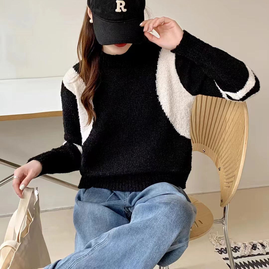 Pull femme avec col montant et manches contrastantes Chic und Stil