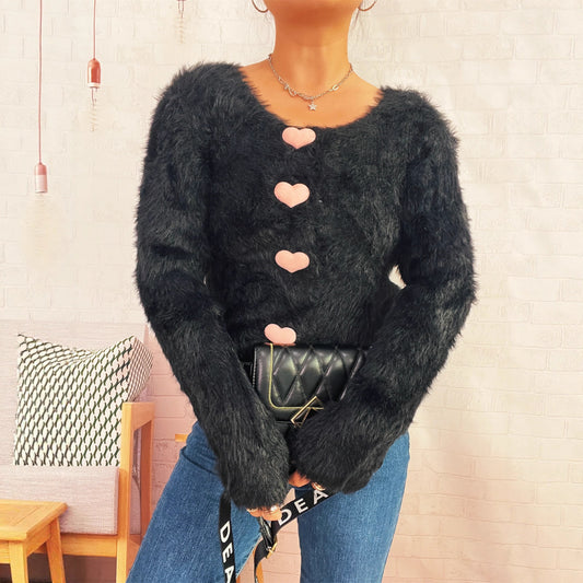 Pull en tricot confortable pour femmes avec boutons en forme de cœur Chic und Stil