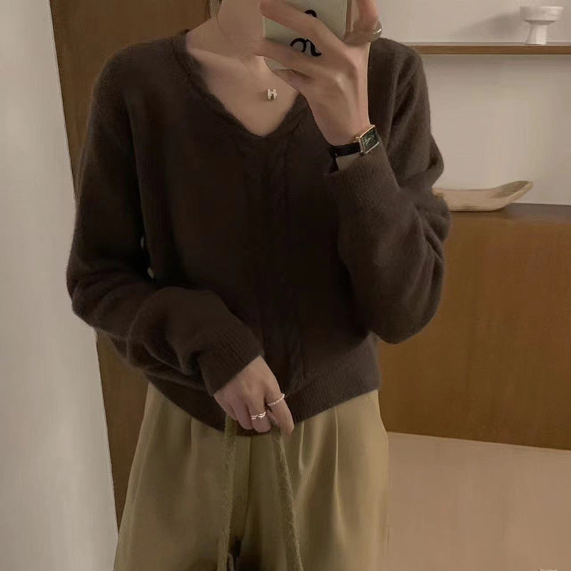 Pull en tricot pour femmes avec décolleté en V et motif torsadé Chic und Stil