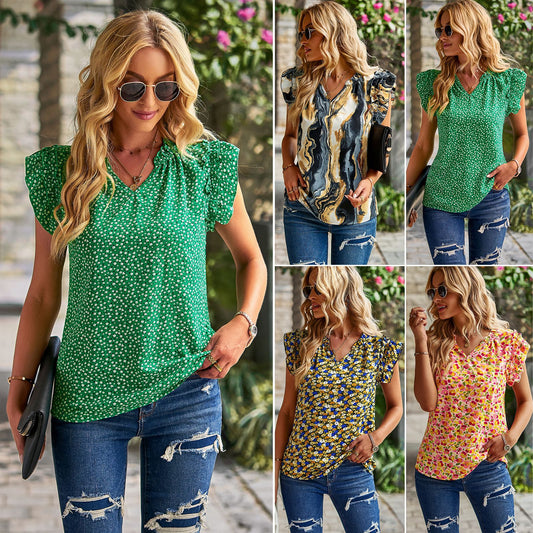 Women's blouse with ruffle details and sophisticated marble pattern Chic und Stil