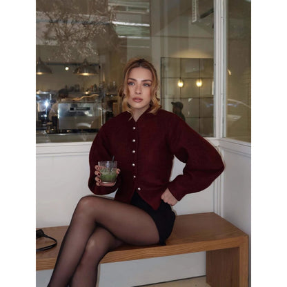 Dames cardigan à la mode avec des boutons frappants Chic und Stil