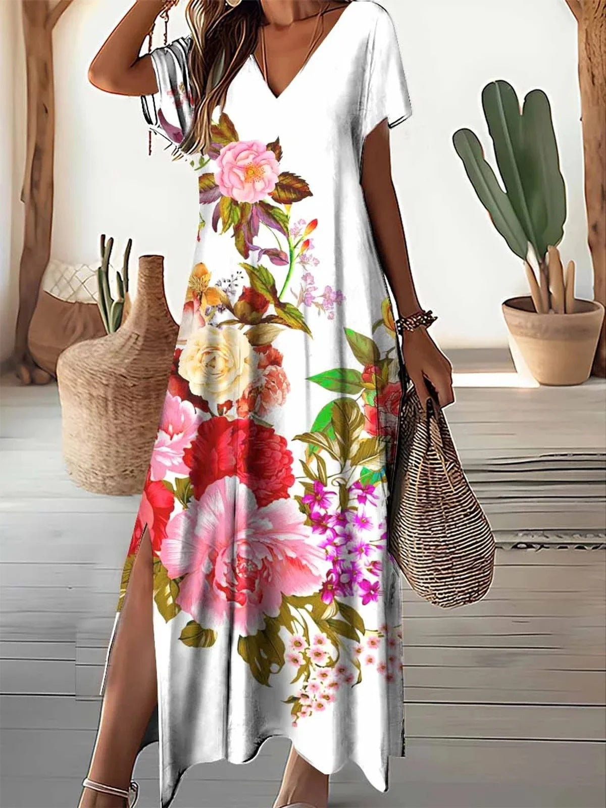 Robe maxi femme avec un motif floral élégant et des fentes latérales Chic und Stil