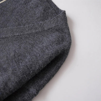 Dames Gilet court en tricot avec décolleté en V et détails de boutons Chic und Stil