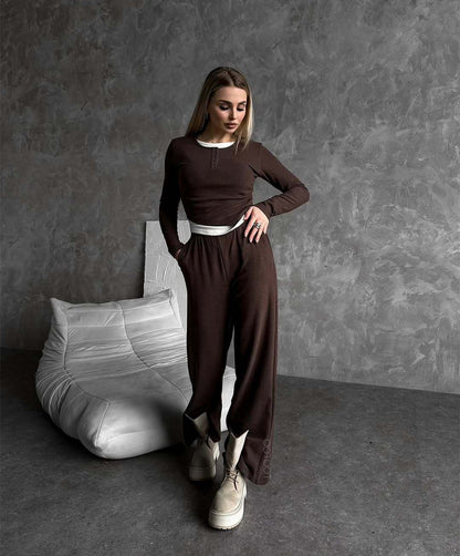 Fashionable lounge set for women with a versatile top and chic elastic pants.