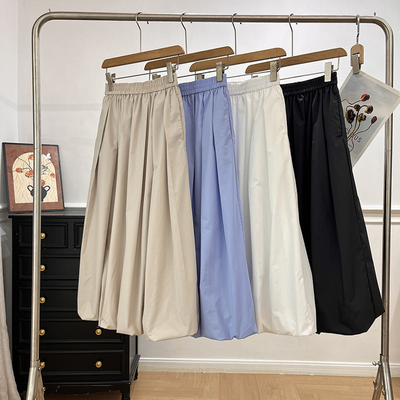 Jupe midi élégante pour femmes avec taille élastique et coupe volumineuse Chic & Stil