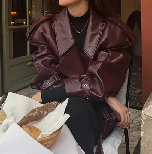 Ladies trendy oversized leather jacket with structured shoulders and waist belt Chic and Style